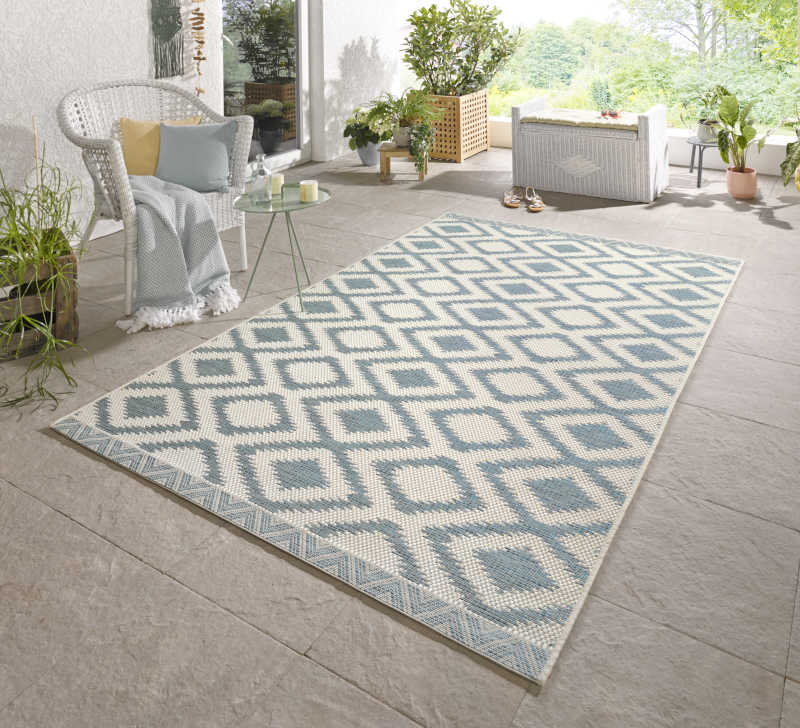 light blue and white diamond patterned rug